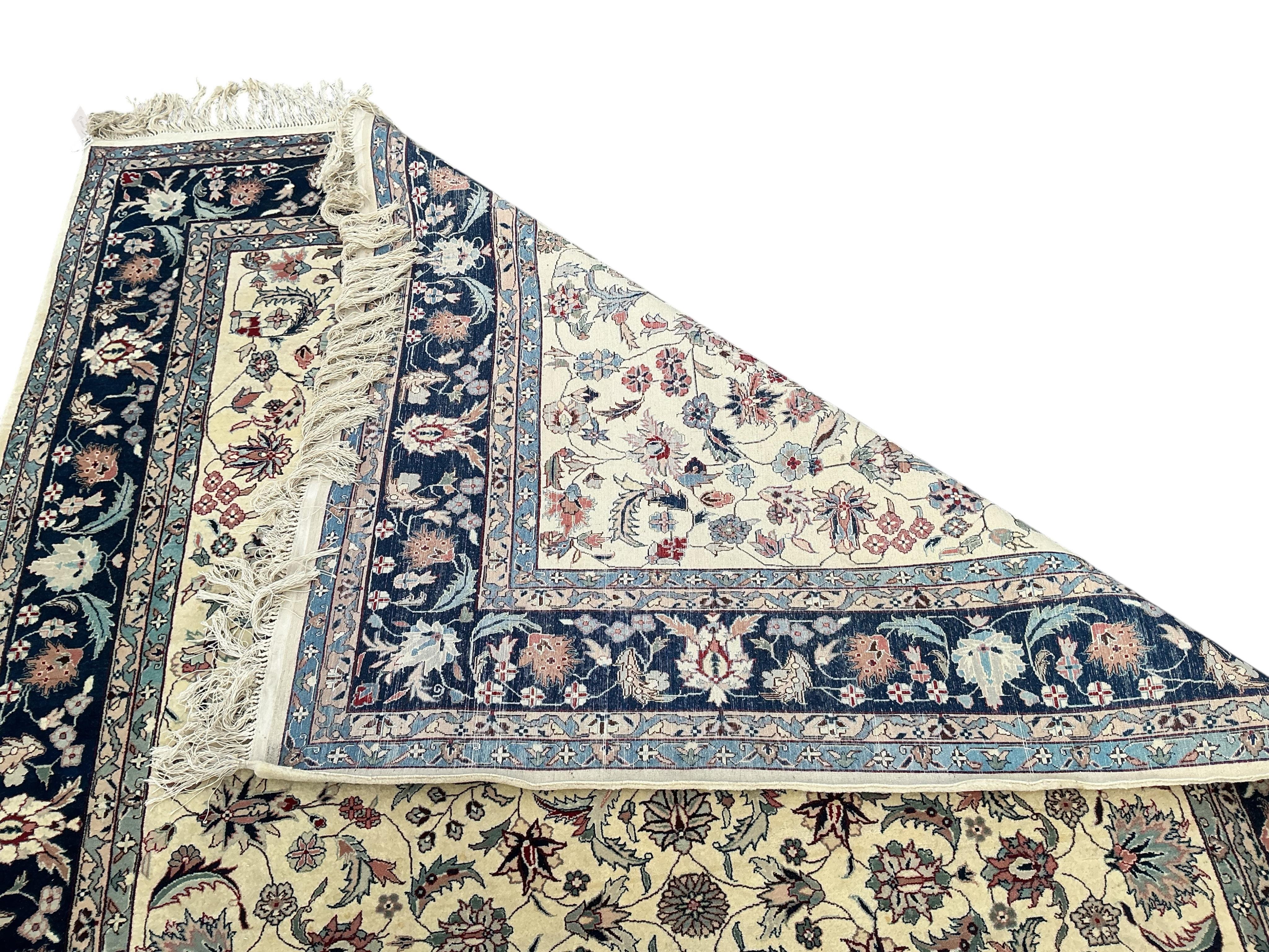 A Tabriz ivory ground floral rug, 240 x 150cm